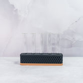 "Front view of empty WOOD AND CARBON Propagation Station, featuring five clear tubes in a wood block with carbon pattern accents."